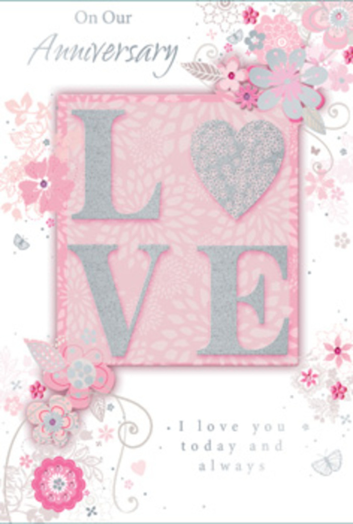 An exquisitely designed anniversary card is shown in close detail, its layout evoking the quiet romance of a stroll around Millwall's leafy backstreets on a soft spring evening. At the heart of the design sits the word LOVE, each capital letter raised from the surface and edged in shimmering glitter that appears both refined and inviting. The glitter is not harsh or overly bright; instead it offers a gentle, pearly sparkle, like morning light brushing over pale petals. The letters rest on a blush-pink panel that subtly contrasts with the softer pink background, adding depth and focus to the composition. Flowing outwards from the central word, delicate, hand-drawn blooms, twining vines, and feathery leaves cascade across the card, echoing the natural movement of a loose bouquet being arranged on a florist's workbench. The flowers are stylised rather than botanical, but clearly inspired by romantic garden blooms, with petals shaded in blush, ivory, and the faintest lilac, all accented with hints of silver foil. Fine filigree lines and tiny hearts or butterflies float among the blossoms, suggesting gentle motion, like petals drifting on a breeze along Millwall's riverside paths. The background is softly tinted in pastel pinks and silvery greys, with subtle gradients that feel almost cloud-like, enhancing the dreamy atmosphere. An anniversary message, such as I love you today and always, appears in flowing, elegant script beneath the central motif and inside the card, reinforcing the theme of enduring affection. The overall impression is that of a handcrafted, bouquet-like tribute in paper form, perfectly suited to accompany anniversary flowers delivered locally throughout Millwall.